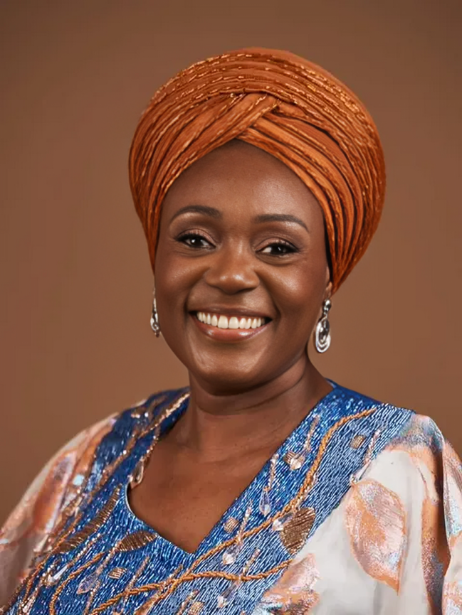 Professional portrait of Remi Odunsi in a formal setting